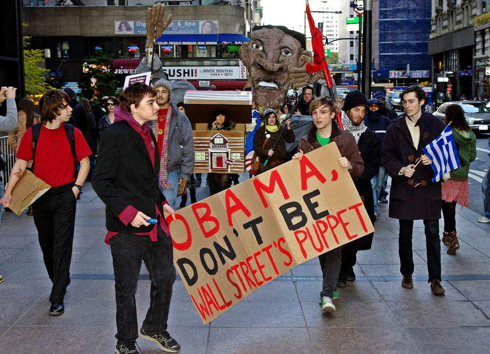 Demonstranten in Oakland: "Obama sei nicht die Marionette der Wall Street". Foto: flickr[David Shankbone|shankbone/6316743072]